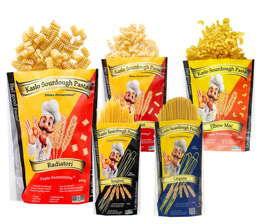 Assorted packages of Kaslo Sourdough Pasta on a white background