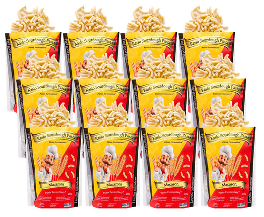 Twelve packages of Kaslo  Sourdough  Macaroni Pasta on a white background