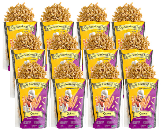 Twelve packages of Kaslo Sourdough Quinoa Pasta  on a white background
