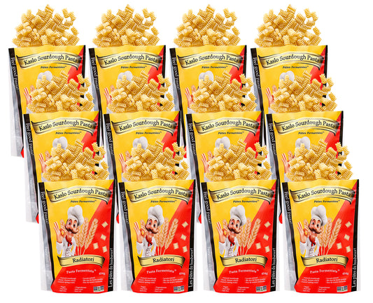 Multiple packages of Kaslo Sourdough Pasta on a white background